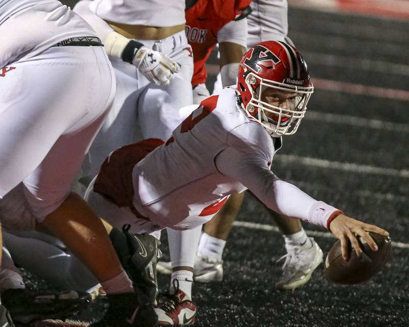 Yorkville's Jack Beetham (2) reaches the ball out to score a touchdown during football game between Yorkville at Bolingbrook Friday, Oct 24, 2025 in Bolingbrook.