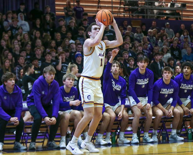 Downers Grove North's Jack Crowley (11) shoots a jumper during their basketball game between Glenbard West at Downers Grove North. Jan 24, 2025 in Downers Grove.