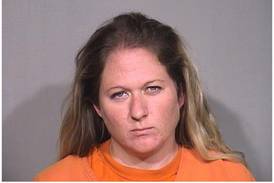 Judge: Woodstock woman made calls from jail about hiding drugs in her home