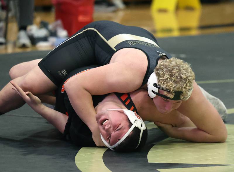 Sycamore’s Collin Hughes pins DeKalb’s 
Nicholas Waddle at 285 pounds Friday, Jan. 16, 2026, at Sycamore High School.