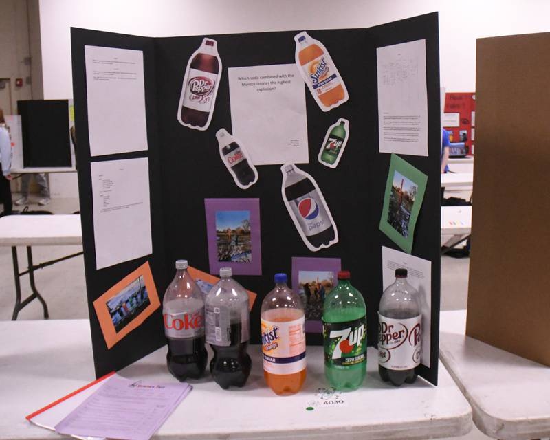One science project explains which soda gets the highest explosion with a mento is on display along with many other projects during the Downers Grove District 58 science fair on Jan. 25, 2025, held at O’Neill Middle School.