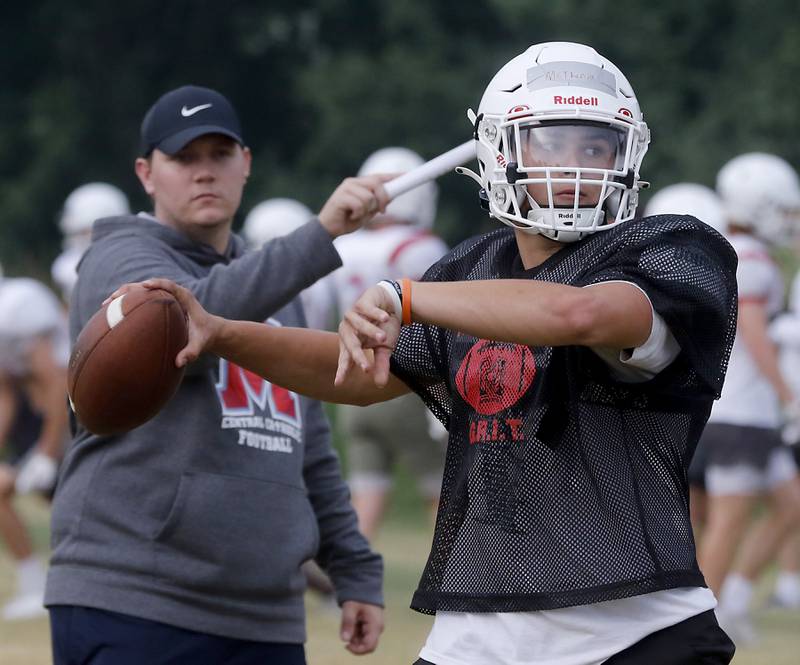 Marian Central’s Cale McThenia throws the football during summer football practice Monday, June 26, 2022, at Marian Central Catholic High School in Woodstock.