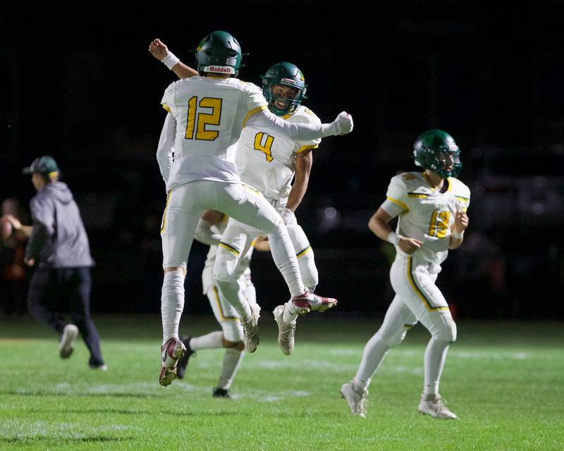 Crystal Lake South's Anthony Demirov (4) celebrates running a touchdown with Aidan Next (12) against Crystal Lake Central on Friday, Sept. 27,2024 in Crystal Lake.