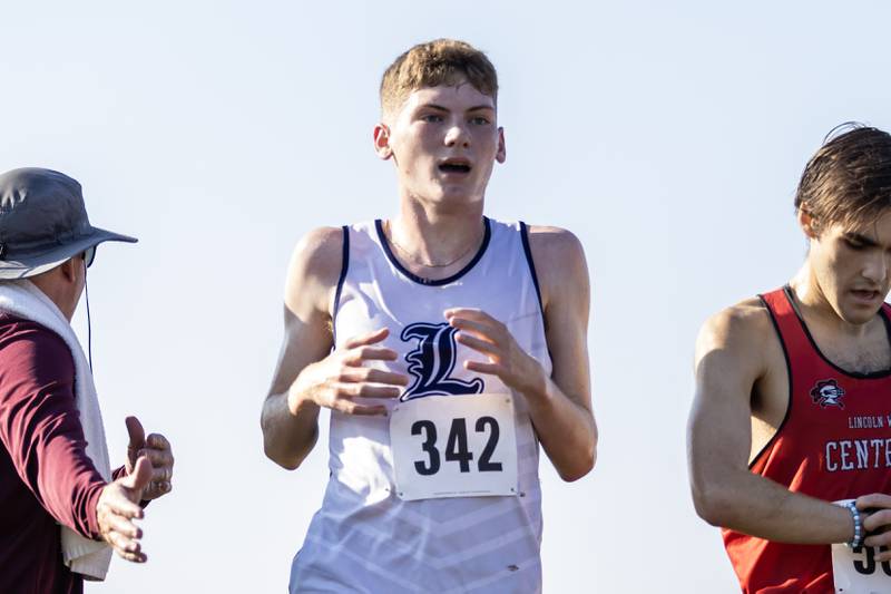 Lemont’s Gavin Nally finishes the Locktoberfest three-mile varsity cross country race at Dellwood Park in Lockport on October. 4, 2025.