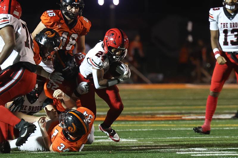 Bolingbrook’s Kale Cooks breaks through the front line o a run against Lincoln-Way West on Friday, Sept. 22 in New Lenox.