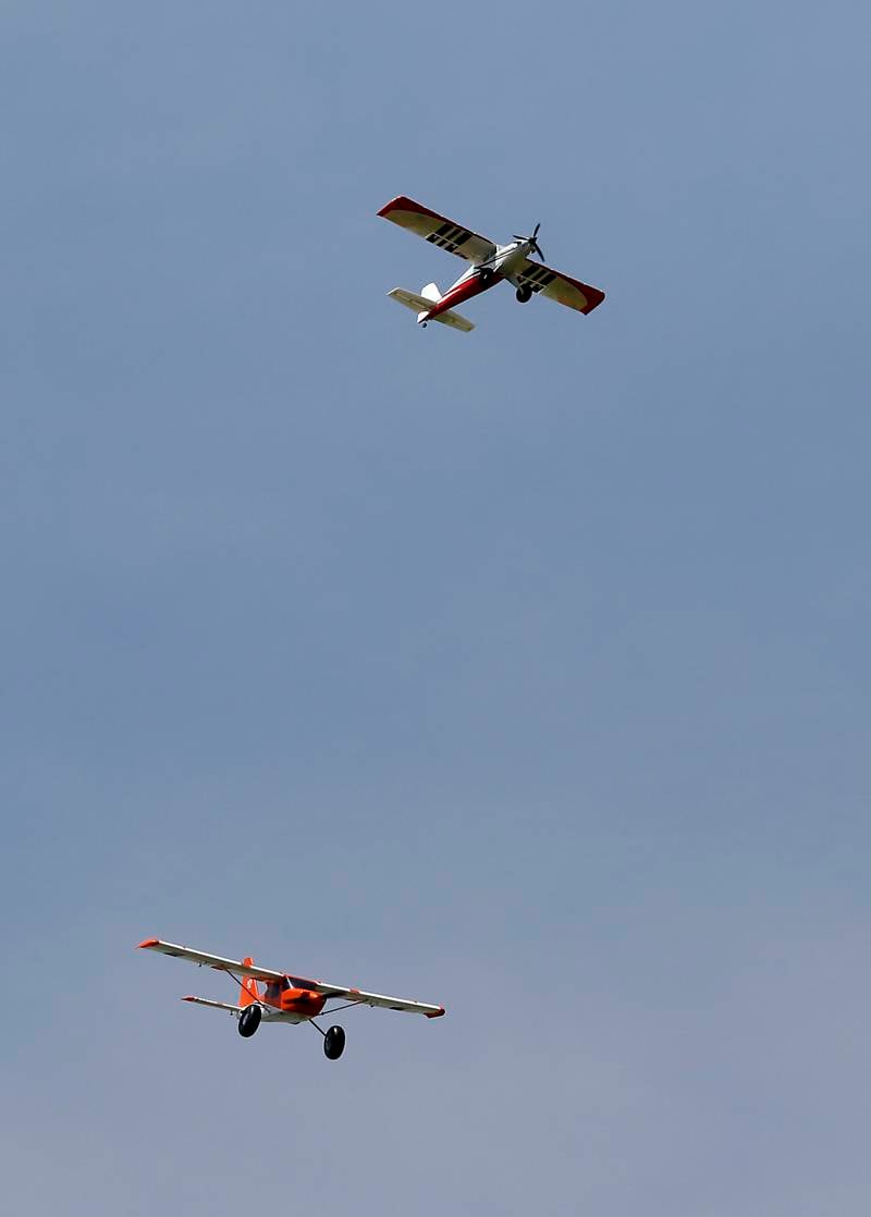 Radio-controlled planes fly on Thursday, Aug. 8, 2024, near Hebron.
