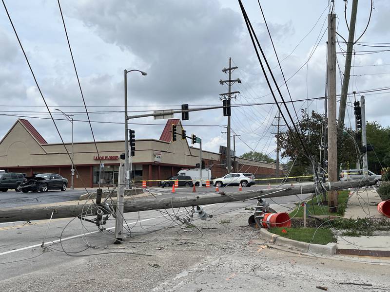 A downed power line near the intersection of Stryker Avenue and West Jefferson Street in Joliet on Tuesda, July 16, 2024.