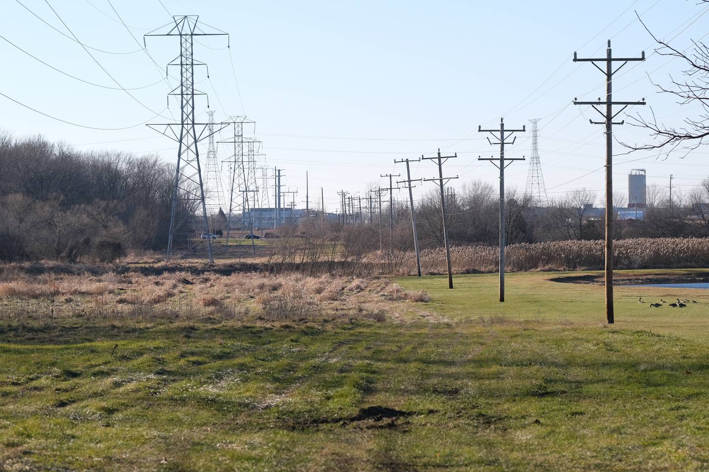 Traffic moves along Illinois Route 59 near the intersection of 143rd Street. Plainfield received federal grant money to extend 143rd Street east to Illinois Route 126. Thursday, Dec. 16, 2021 in Plainfield.