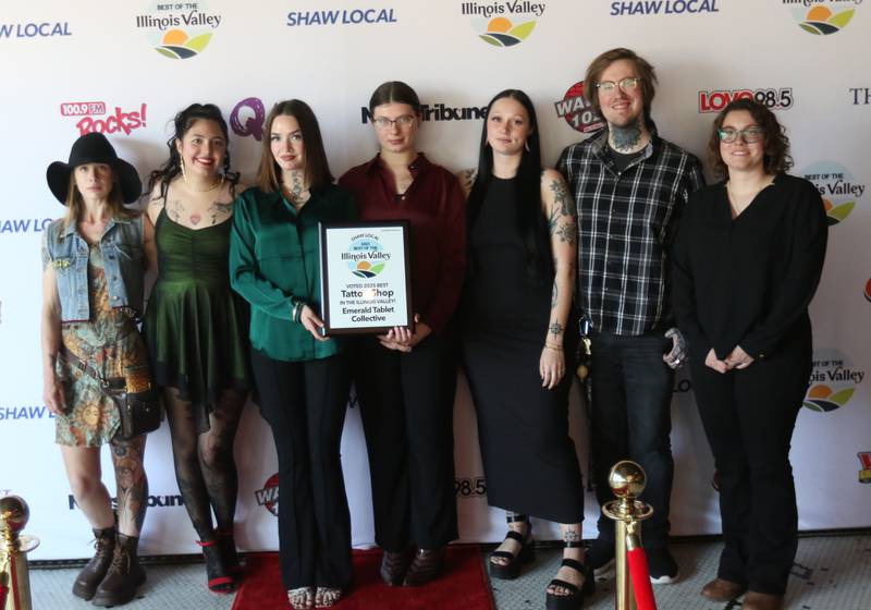 The staff of Emerald Tablet Collective pose for a photo during the second annual Best of the Illinois Valley event on Thursday at the Auditorium Ballroom in La Salle.