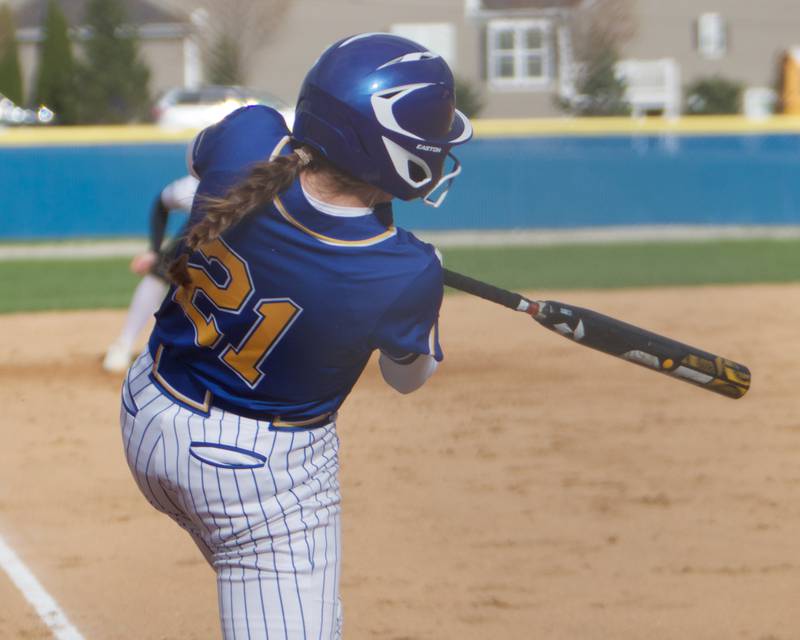Wheaton North's Reagan Crosthwaite  connects for a homer against St. Charles East on Monday, April 21, 2025 In Wheaton.