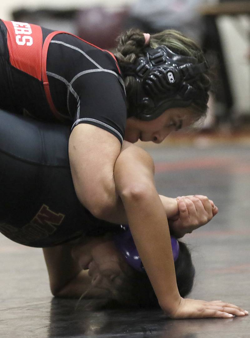 Huntley’s Grecia Garcia controls Morris’ Dulce Xique in the 135-pound match of a nononference wrestling meet on Wednesday, Jan. 22, 2025, at Huntley High School.