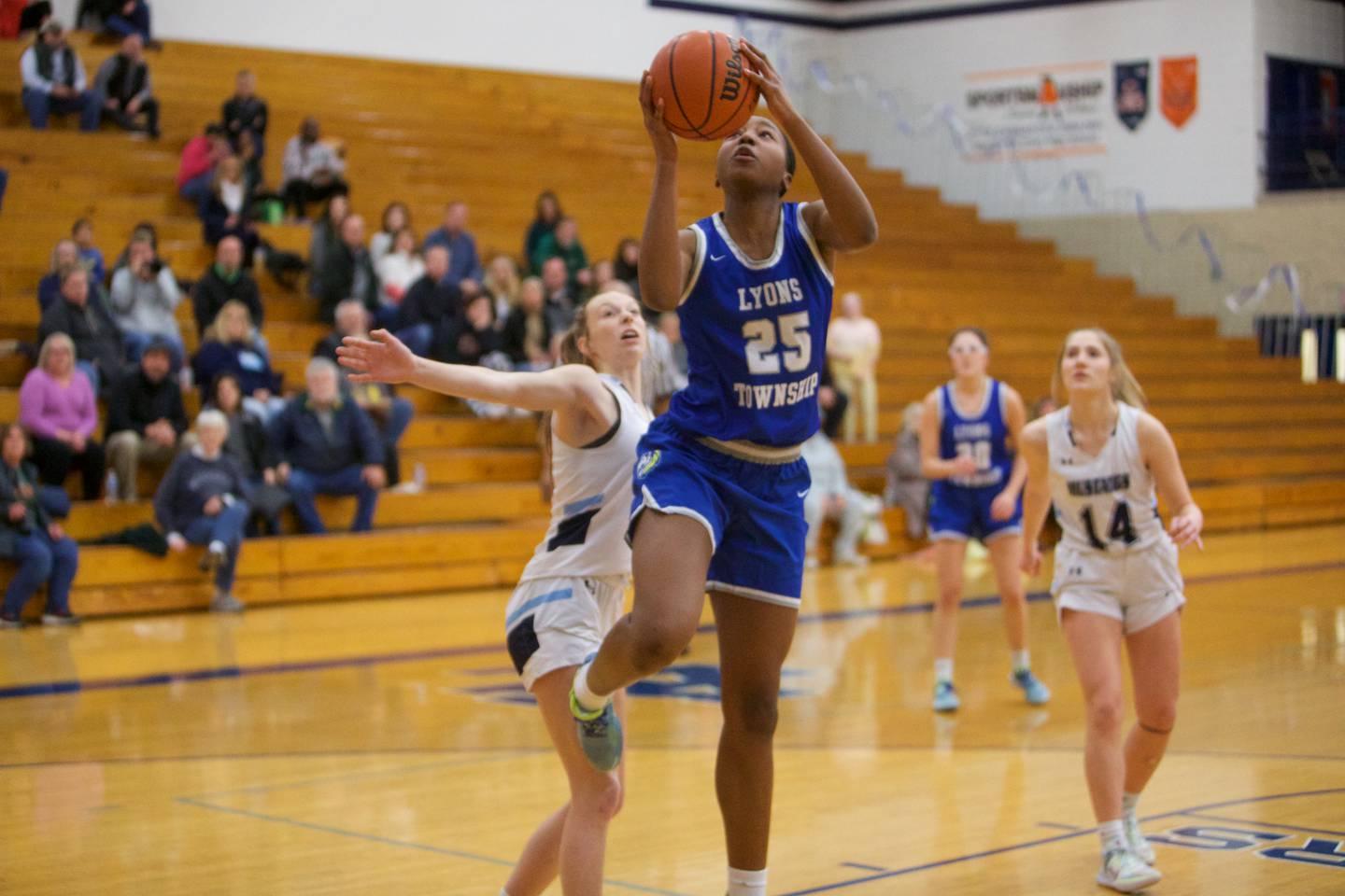 Lyons Nora Ezike goes in for the shoot against Downers Grove South at the West Suburban Conference Crossover Championship on Wednesday, Feb.8,2023 in Addison.