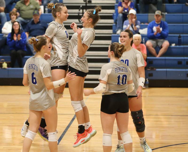 Princeton's Keighley Davis chest bumps teammate Kathy Maciczak after scoring a point against El Paso-Gridley in the Class 2A Regional Semifinals on Tuesday, Oct. 29, 2024 at Fieldcrest High School.