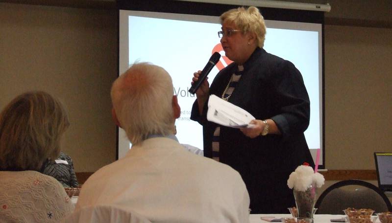 Director of the Illinois Department on Aging, Paula Basta, congratulating and thanking volunteers at the Volunteer Recognition event