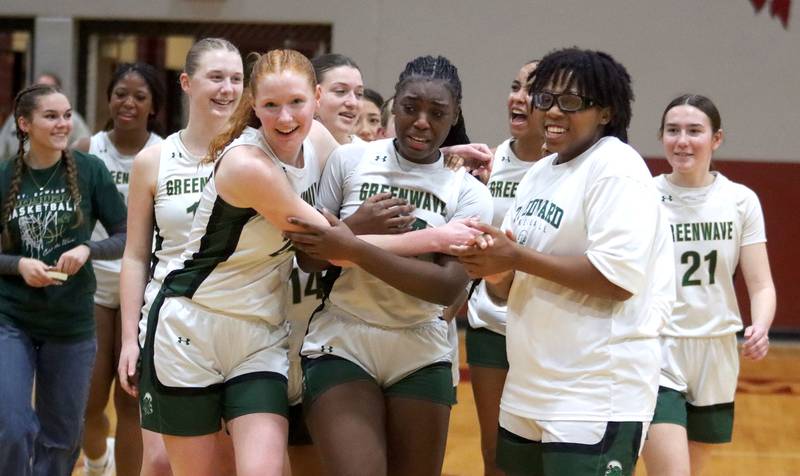 St. Edwards’ Green Wave are all smiles after defeating Marengo in IHSA Regional Championship girls basketball on Thursday, Feb. 19, 2026, at Marengo High School in Marengo.