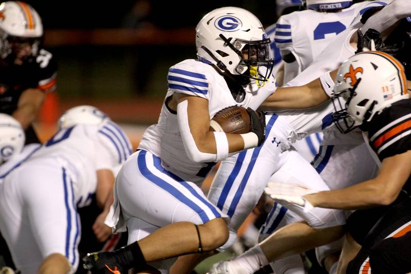 Geneva’s Tommy Diamond rushes for a touchdown during a game at St. Charles East on Friday, Sept. 30, 2022.