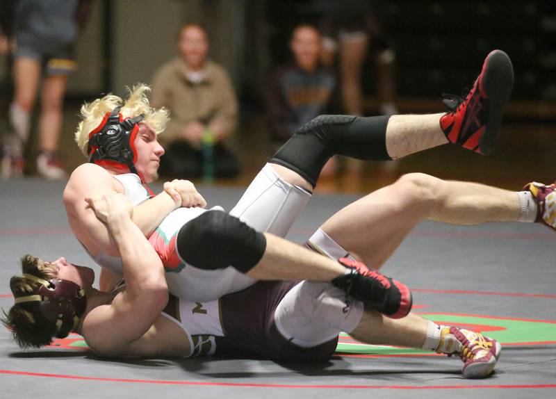 L-P's Tyler Witzcak wrestles Morris's Ian Semlar on Thursday, Jan. 11 2024 in  Sellett Gymnasium.