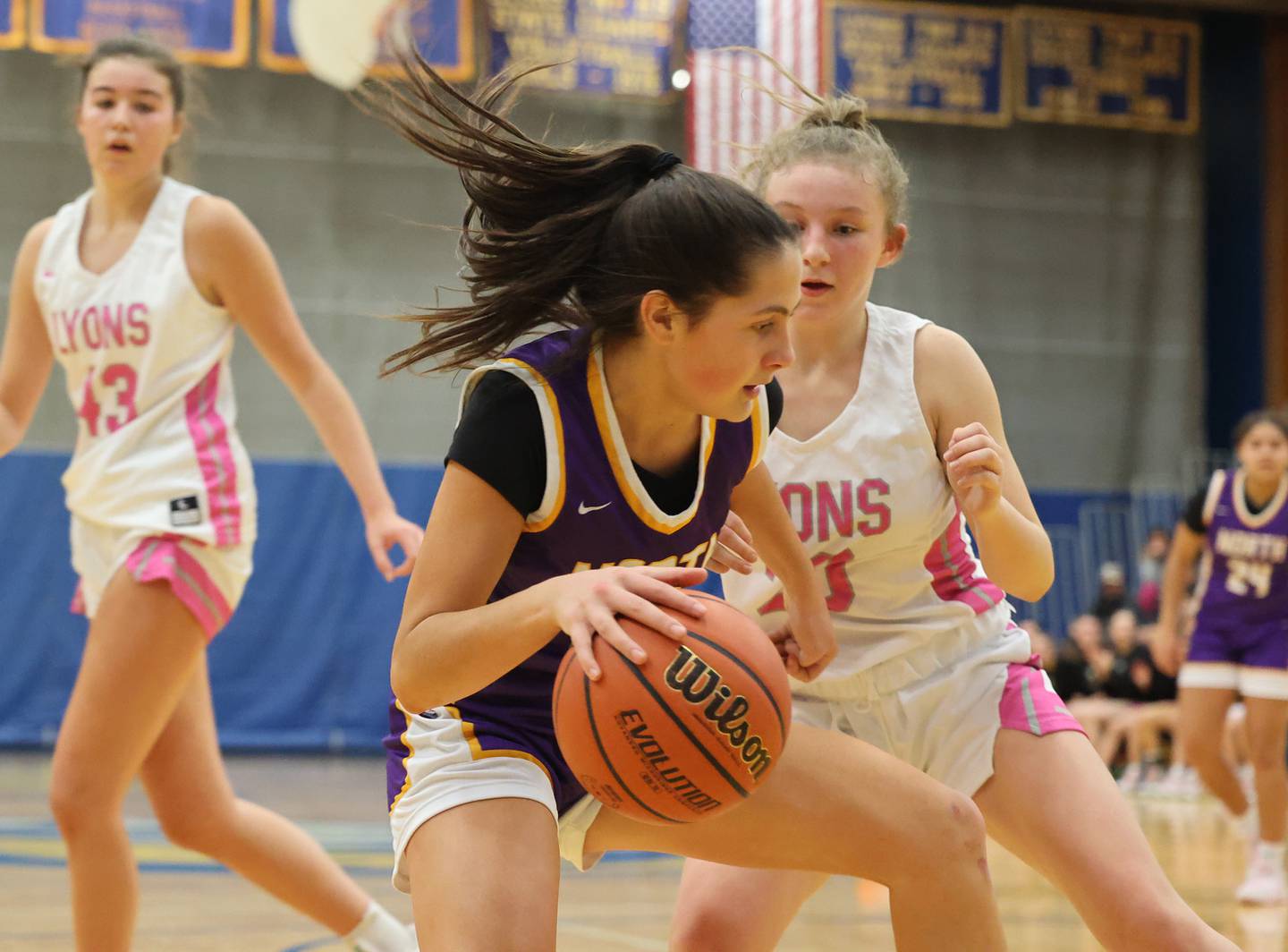 Downers Grove North’s Campbell Thulin (5) drives to the basket against Lyons Township during the girls varsity basketball game on Tuesday, Jan. 16, 2024 in La Grange, IL.