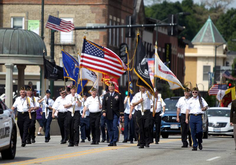 Members of St. Charles VFW Post 5036 kick off the St. Charles Memorial Day Parade on Monday, May 30, 2022.