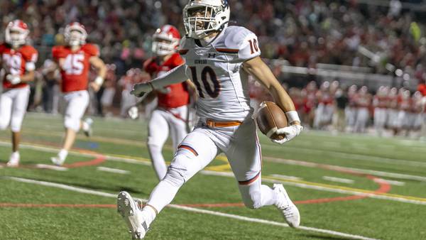 Photos: Oswego, Naperville Central football meet in season opener