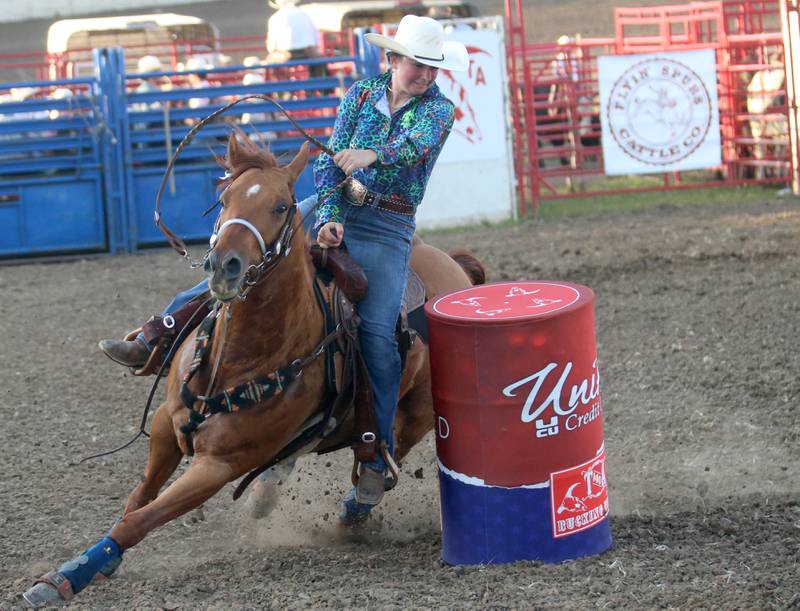 Ashley McComb of Morris, barrel races during the Starved Rock Rodeo on Saturday, June 21, 2025 at the La Salle Speedway.
