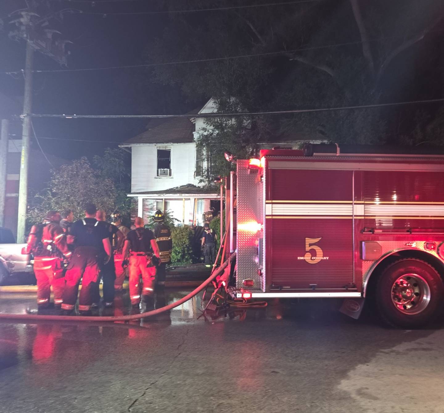 A two-story home suffered heavy fire, smoke and water damage in an overnight fire in the 300 block of Oneida Street in Joliet on Monday, July 14, 2025.