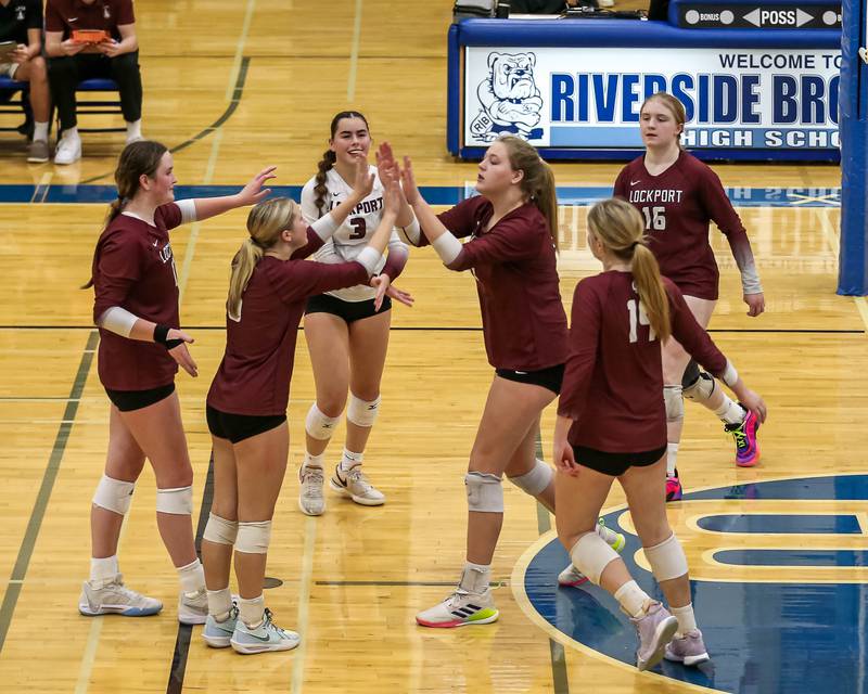 Lockport celebrates a point during Class 4A Riverside-Brookfield Supersectional match between Lockport at Downers Grove South.  Nov 11, 2024  in Riverside.