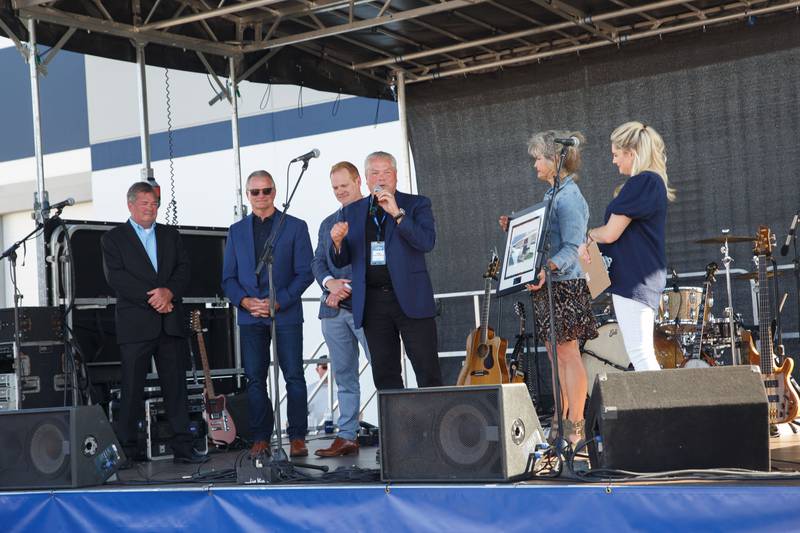 Ray Neisewander III, chairman and CEO of Raynor Worldwide, speaks during the Sept 9 grand opening celebration in Dixon.