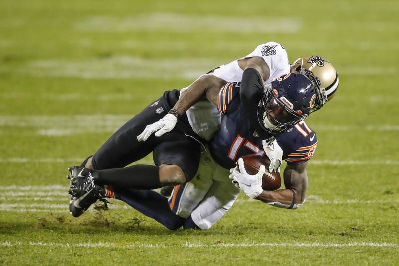 Chicago Bears wide receiver Anthony Miller (17) is tackled by New Orleans Saints safety Chauncey Gardner-Johnson (22) during the second half of an NFL football game, Sunday, Nov. 1, 2020, in Chicago. (AP Photo/Kamil Krzaczynski)