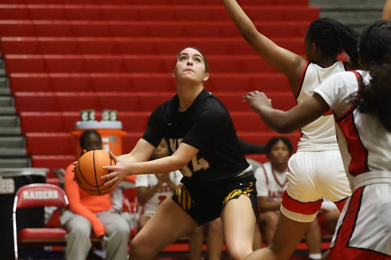 Joliet West’s Natalie Clemente works under the basket against Bolingbrook on Thursday, Jan 23, 2025 in Bolingbrook.