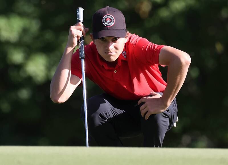 Ottawa’s Chandler Creedon lines up his putt on the third hole Monday, Sept. 23, 2024, during the Interstate 8 boys golf tournament at the Kishwaukee Country Club in DeKalb.