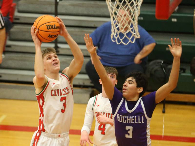 L-P's Braylin Bond eyes the hoop over Rochelle's Kasin Avila on Friday, Feb. 13, 2026 in Sellett Gymnasium at L-P High School.
