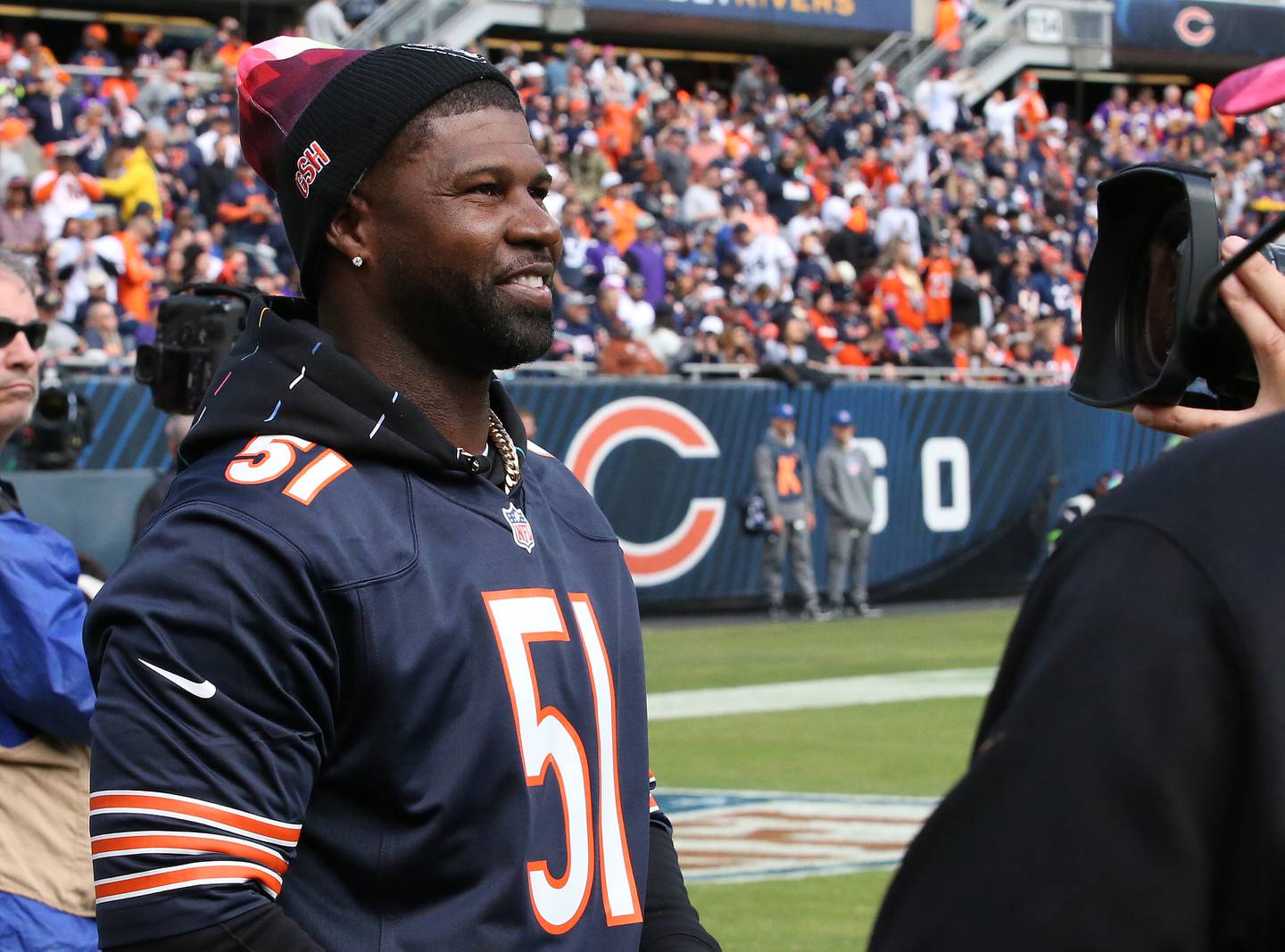 Chicago Bears former player Devin Hester wears a Dick Butkus jersey while watching on the sidelines on Sunday, Oct. 15, 2023 at Soldier Field.