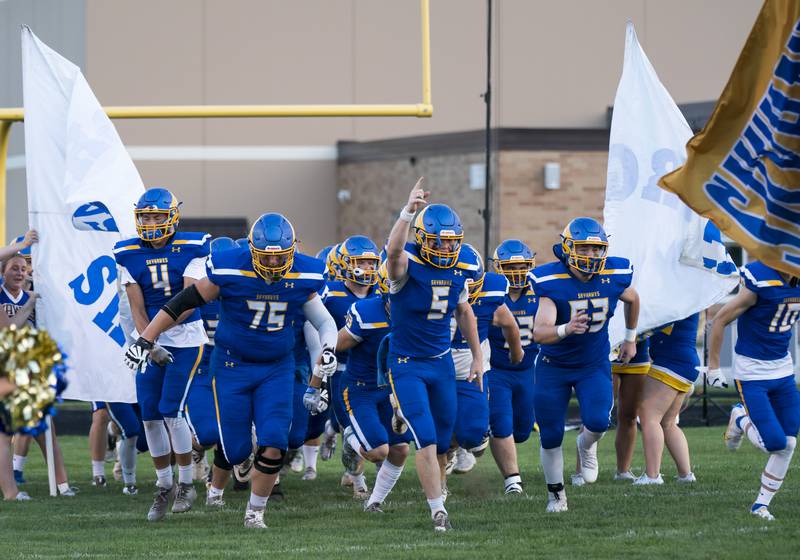 Johnsburg takes the field during introductions at the Johnsburg vs. Marian Central football game on Friday, August 27 at Johnsburg High School.