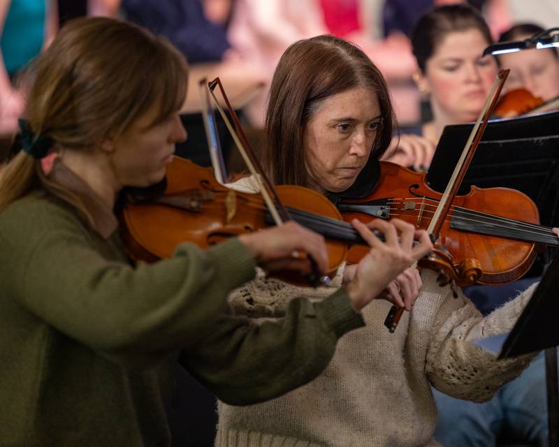 Violinist of the Illinois Valley Symphony Orchestra plays during the performance of the "Nutcracker" on Monday, December 8, 2025 in the Matthiessen Memorial Auditorium at LaSalle-Peru Township High School in LaSalle.