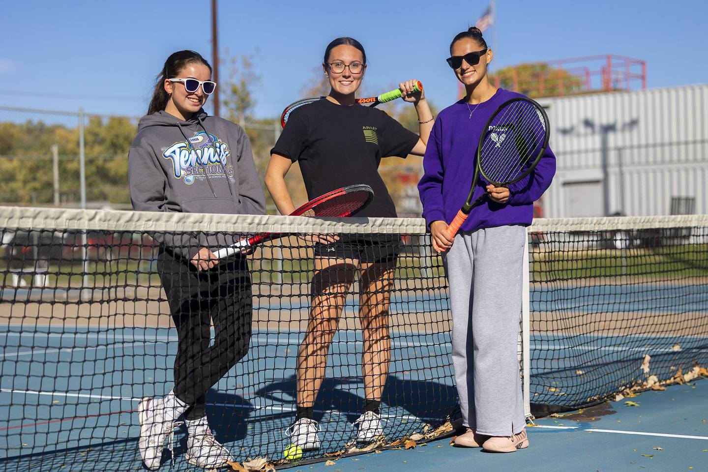 Dixon tennis players Jenna Mustapha (left), Rachel Lance and Brooklyn Arjes will be competing the IHSA state tournament this weekend.