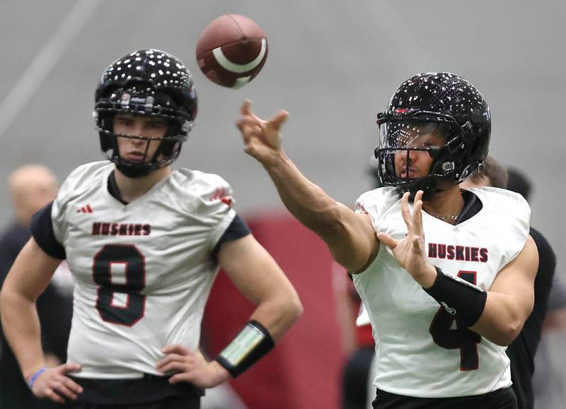 Northern Illinois University quarterback C.J. Jordan throws a pass Tuesday, March 26, 2024, during spring practice in the Chessick Practice Center at NIU in Dekalb.