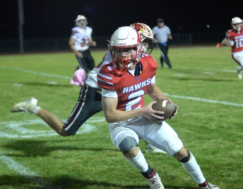 Oregon's Cooper Johnson (2) runs back an interception in the fourth quarter against Stillman Valley on Friday, Oct. 4, 2024 at Landers-Loomis Field in Oregon.