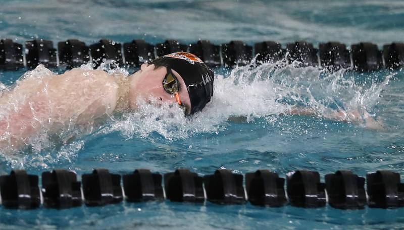 McHenry’s Robbie Rosenbaum competes in the 100 Freestyle during the Fox Valley Conference Invitational swim meet on Saturday,  Feb. 15, 2025, at Woodstock North High School.