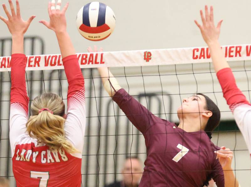 Morris's Rosemary Misener saves the ball as L-P's Aubrey Duttlinger defends during the Class 3A Sectional semifinal game on Tuesday, Nov. 4, 2025 in Sellett Gymnasium at L-P High School.