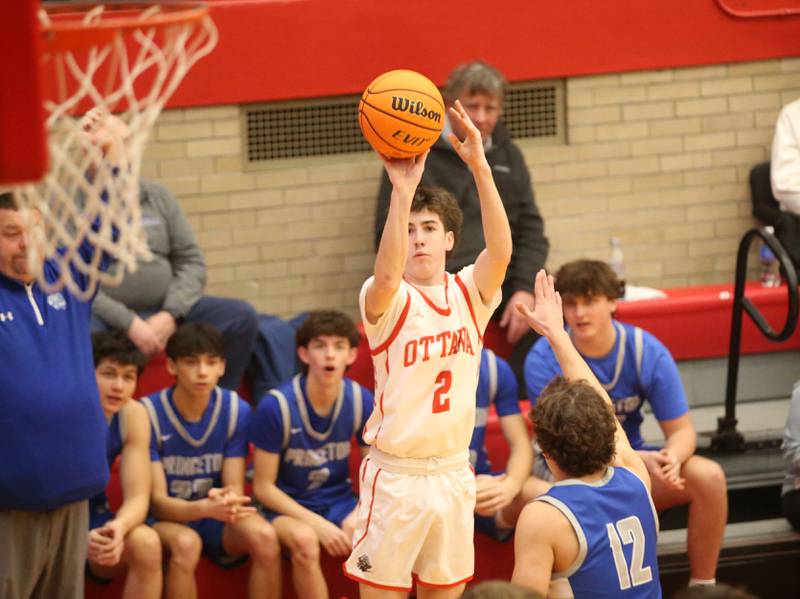 Ottawa's Colt Bryson shoots a jump shot over Princeton's Asa Gartin on Monday, Feb. 3, 2025 in Kingman Gymnasium at Ottawa High School.