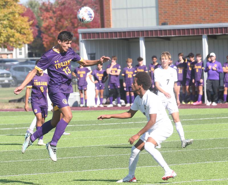 Mendota's Sebastian Carlos puts a header on the ball to advance it past Quincy Notre Dame's Tedros Berhorst during the Class 1A Sectional semifinal game on Saturday, Oct. 21, 2023 at Illinois Valley Central High School in Chillicothe.