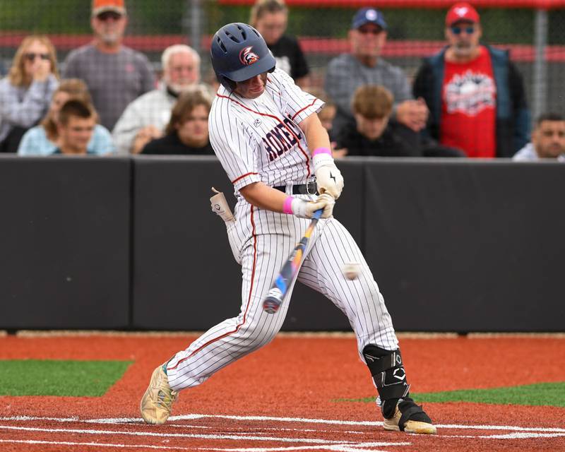 Romeoville's Nate Lubinski (14) makes contact with the ball during the regional game against Yorkville on Thursday May 29, 2025, held at Yorkville High School.
