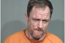 Antioch man who hid gun in squad car in McHenry gets 20 years in prison for weapon, drug offenses