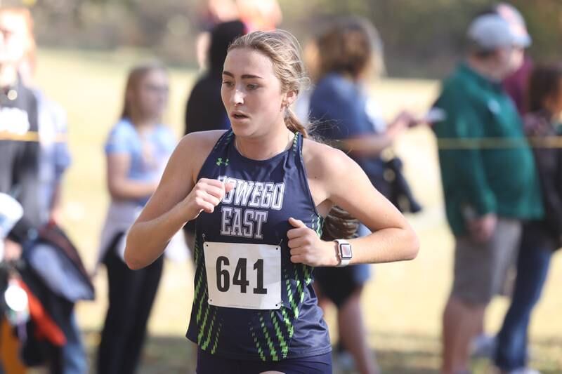Oswego East’s Morgan Dick finishes third in the Girls Cross Country Class 3A Minooka Regional at Channahon Community Park on Saturday.