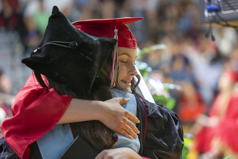 Em Stroup hugs Dr. Lori Cortez Friday, May 9, 2025, after receiving her diploma during SVCC’s commencement.