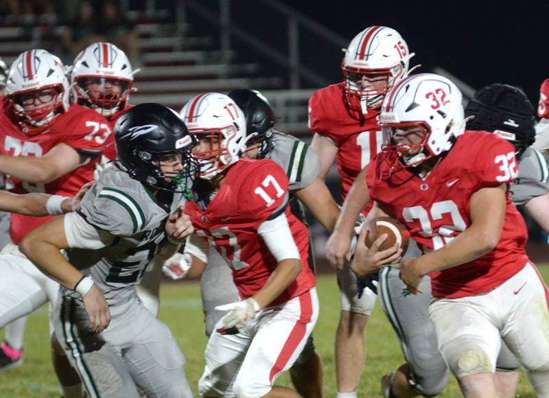 Oregon's Jakob Moser (32) runs with the ball against Rock Falls on Friday, Sept. 19, 2025 at Landers-Loomis Field in Oregon.