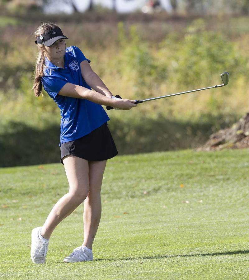 Newman’s Reagan Hammes swings on #1 at Emerald Hill Wednesday, Sept. 24, 2025.
