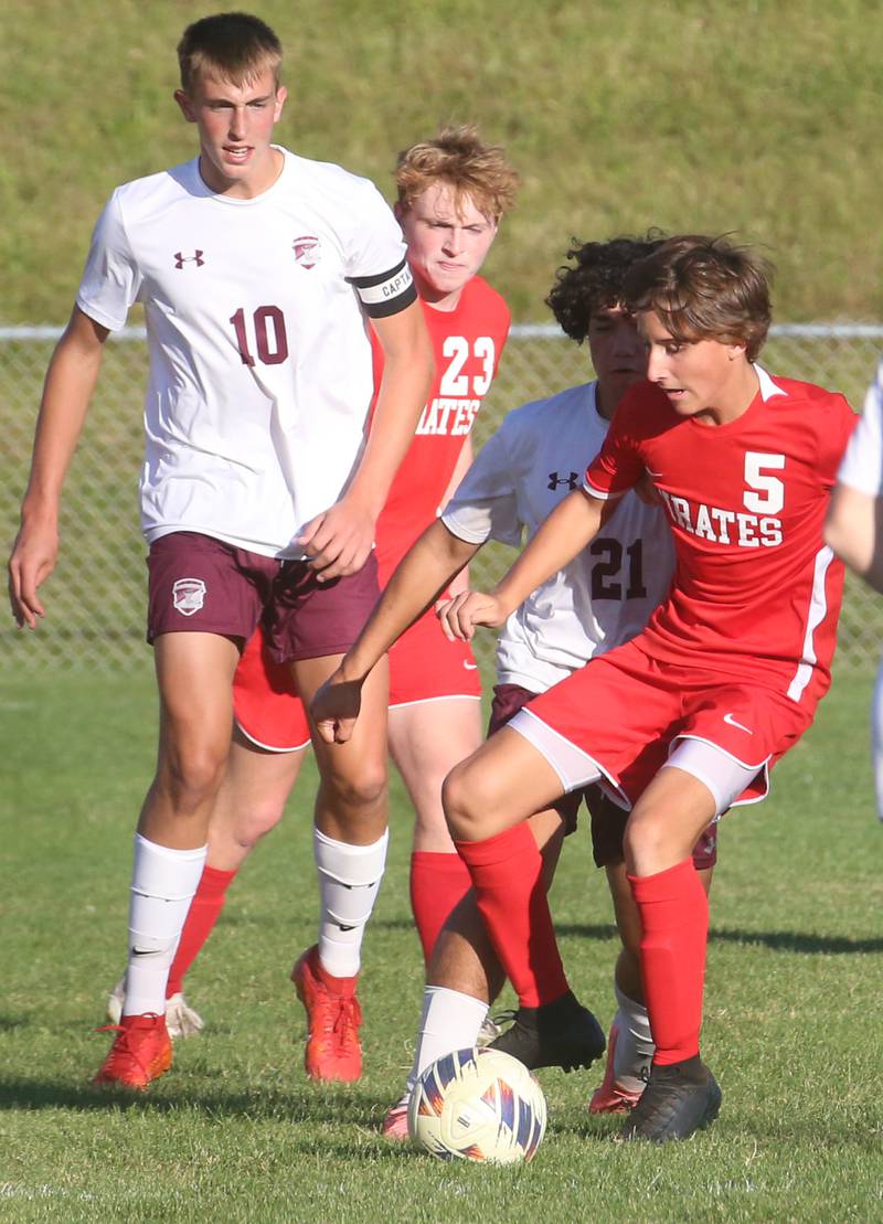 Ottawa's Rory Moore tries to free the ball against Illinois Valley Central's AJ Toliver on Monday, Oct. 7, 2024 at King Field.