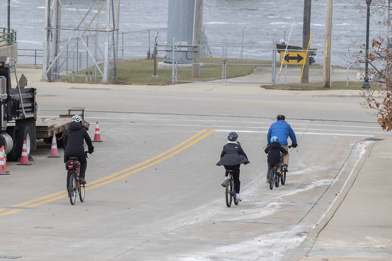 Riders head off toward Lowell Park on Wednesday, Jan. 1, 2025, for the annual New Year's Day bike ride.